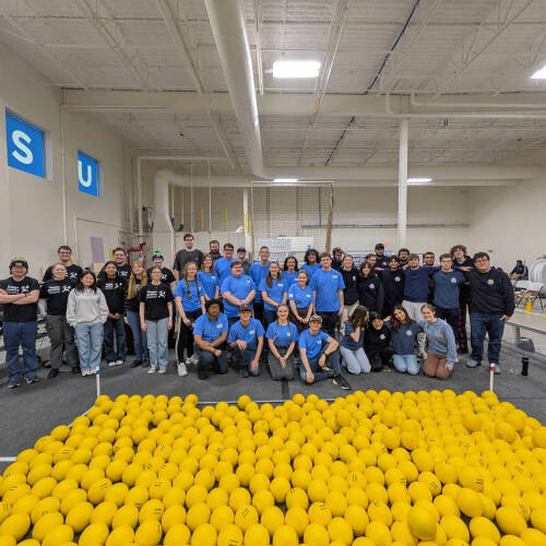 Ri3D teams take a group photo at the GVSU practice field
